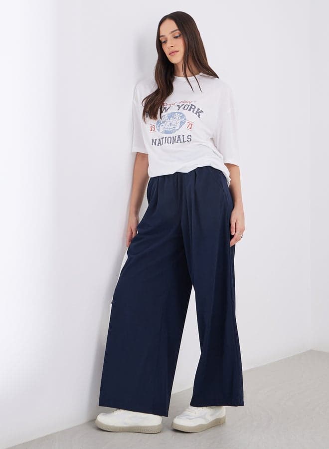 Women Navy Blue Corduroy Wide Leg Trousers - Image 1