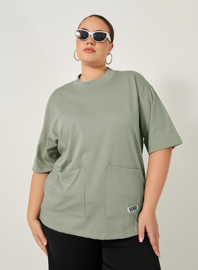 Plus Size Oversized Round Neck T-Shirt with Utility Pockets - Image 1