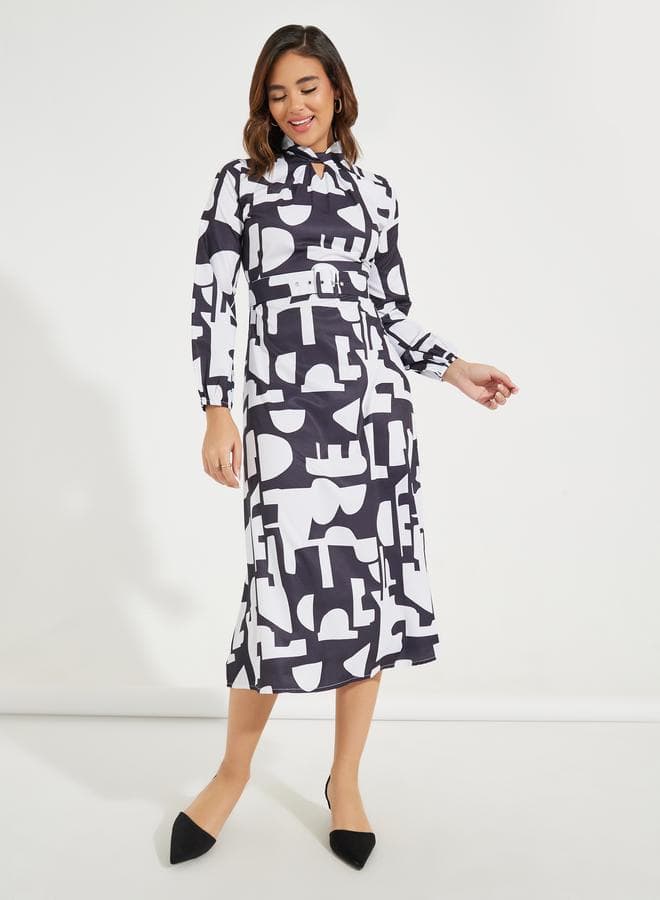 Abstract Print Midi Dress with Tie Neck and Belt - Image 1